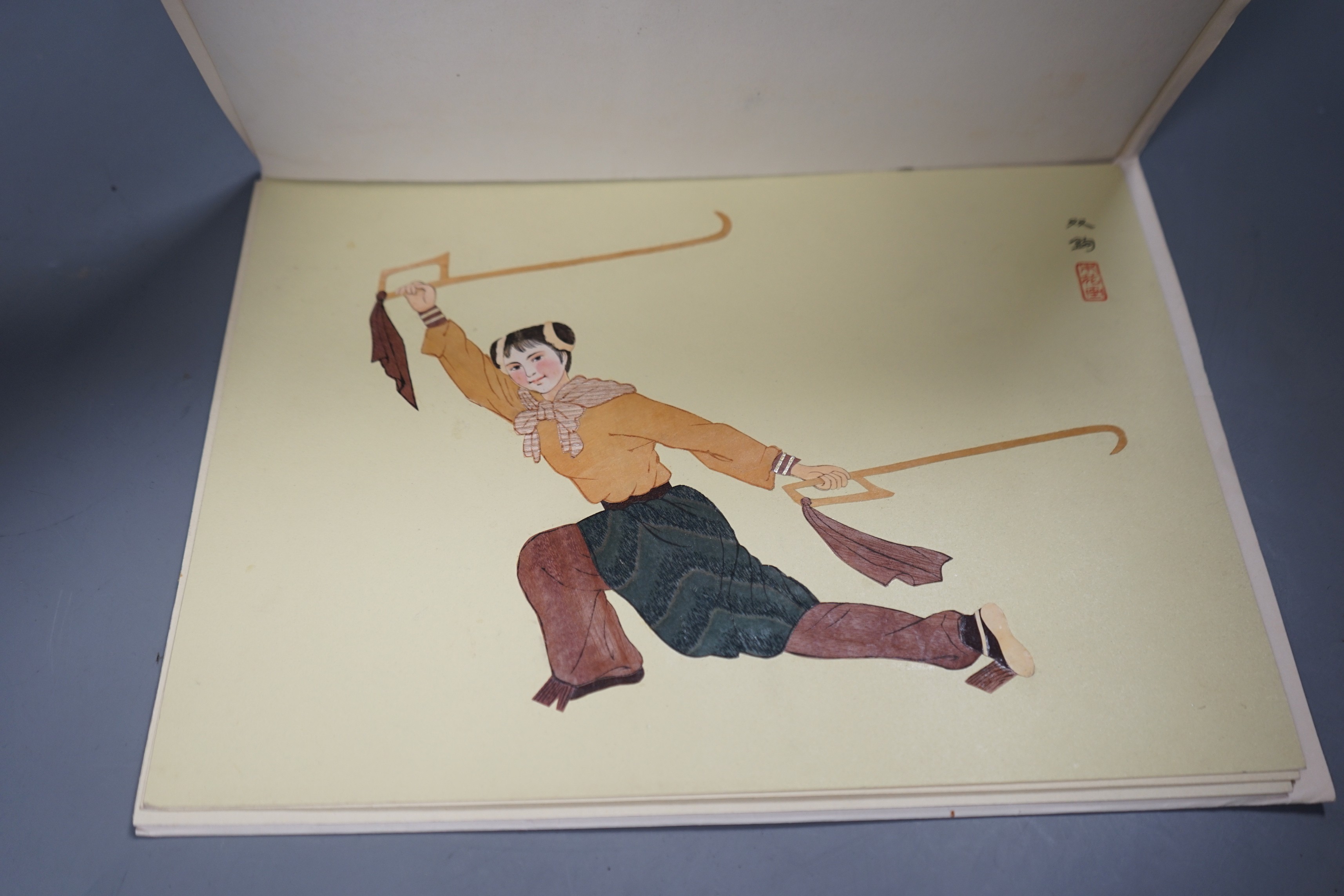 A set of six Chinese woodblock and painted pictures of martial arts, 30cms wide x 22cms high